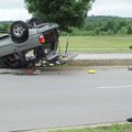 MERCURY MISHAP - Brady Williams of Fayetteville records a video Friday as his Mercury Mountaineer is...