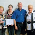  Outstanding Youth Award recipient Jamie Harris, third from left, is joined by her mom, Sherri Harri...