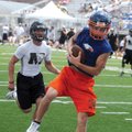 Rogers Heritage’s Christian Wages, right, catches a touchdown pass against McAlester, Okla., during ...