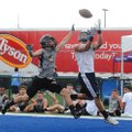 File Photo: Shiloh Christian’s Zann Jones, right, catches a touchdown in front of Bentonville’s Dall...
