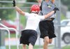 Bentonville’s Alex Horton hauls in a touchdown pass during Monday’s action against Farmington in the Northwest Arkansas 7-on-7 Passing League in Bentonville’s Tigers Stadium.