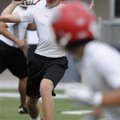 Farmington’s Trey Spencer throws to a receiver during Monday’s action in the Northwest Arkansas 7-on...