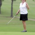 Judy Harris watches as her putt for birdie just misses the cup on the No. 2 green Tuesday during the...