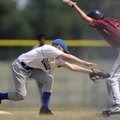 NWA’s Dayton Upchurch, left, tags out Bentonville’s Jacob Ivey after catching him in a rundown Thurs...