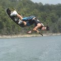 BIG AIR ON BEAVER - Phillip Remerscheid does a somersault on his wakeboard Thursday at Beaver Lake. ...