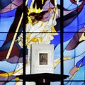 A Bible stands on a lectern at St. Raphael Catholic Church in Springdale. Several Christian minister...