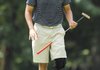 Anthony Delao smiles after sinking a long putt for eagle on No. 4 during the club championship tournament Saturday at Paradise Valley Athletic Club in Fayetteville.
