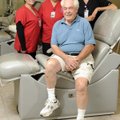 Gardiner Powell, front, is one of the many donors who give blood or platelets with the help of Marib...