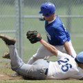 Rogers High’s Jake Rylee, top, is tagged out by Springdale Har-Ber’s Preston Cash while attempting t...