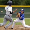 Rogers High’s Jason Selderidge catches Springdale Har-Ber’s Jeff Kadri attempting to steal second ba...