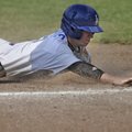 Fayetteville Lindsey’s Matt Steele slides into third base during Monday’s game against Mountain Home...