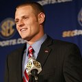 Arkansas quarterback Ryan Mallett talks to the media during the Southeastern Conference football med...