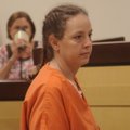 Reta Flowers pleads not guilty to a charge of first-degree murder Wednesday before Washington County...