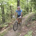 Tom Williams of Fayetteville pedals his way along the War Eagle Valley Loop at Hobbs State Park-Cons...