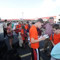 Jacob Moseley, 14, of Rogers, right, is checked in by Zach Watts, 16, of Bentonville as other member...