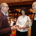 Rotary International president Ray Klinginsmith, left, talks to Steve and Cheryl Miller of the Sprin...