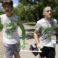 Thomas Gifford, 17, left, and Justin Plummer carry their team’s stretcher Tuesday while competing in...