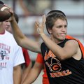 Gravette senior quarterback Colton Davis takes aim at a moving target Friday while participating in ...
