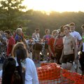 Competitors gather in the transition area shortly after sunrise waiting to begin the Shark Fest IV T...