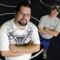 Doug Freeman, left, was recently named Rogers Heritage’s new wrestling coach and Jason Hall is the p...