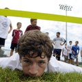 Tyler Lancaster, 13, waits on Tuesday for the signal to go while participating in prone sprint drill...