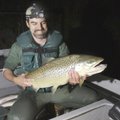 Former state trout biologist Darrell Bowman holds “Ole Whup (insert word that rhymes with bass)” whe...