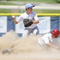  Northwest Arkansas’ Brandon Jansen looks to make a double play Thursday after tagging out Rawlings ...