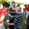 SCHOOL SOCIAL - Beth Zabinski, left, second-grade teacher at Eastside Elementary School, talks Thurs...