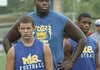 Offensive lineman Antonio Cooksey (second from left), who transferred to North Little Rock from Little Rock Fair in February, is working toward being a force for the Charging Wildcats this fall. Coach Brad Bolding, who said he hopes to develop Cooksey into a major college prospect, has drawn advice from several NFL coaches.