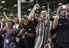 Autoworkers cheer Friday as President Barack Obama speaks at the Jefferson North Chrysler plant in Detroit.