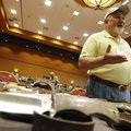 CUTBACKS - Bob Ham of Hendersonville, N.C., talks Friday about the impact the economy has had on the...