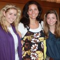 Lisa Devine, center, is joined by her daughter Shelby Devine, left, and Blakely Roberts for the Broa...