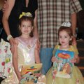 “Princesses” Esther Moore, front from left, and Graceyn Moore enjoy the Broadway Breakfast with thei...