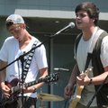 ROCKING OUT - Nick Keller, right, and Dylan Roth perform Saturday with their band Samurai Luncheon d...