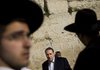 Former Gov. Mike Huckabee, a frequent visitor to Israel who says he’s felt more fear “in Little Rock or New York” than in the Holy Land, stands at the Western Wall in Jerusalem in February.