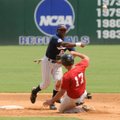 Houston Kyle Chapman’s Leon Byrd, turns a double play Sunday as Houston Angels’ Jake Bledsoe slides ...
