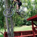 Brandon Proctor, 15, flies off a high jump on Sunday at Slaughter Pen Bike Park in Bentonville. Bran...