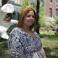 Ana Maria Matos, of Brooklyn, N.Y., poses for a photo in New York on Monday, Aug. 2, 2010. An AP-Uni...