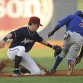 Northwest Arkansas shortstop Chris McConnell, left, applies the late tag as Tulsa’s Anthony Jackson ...