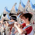 The tuba section marches and sweats its way through a boot camp drill Tuesday at Bentonville High Sc...