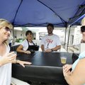 GRAPE GOODNESS - Toni Blasi, left, and Shannon Burckart, right, both of Bentonville, sample a glass ...