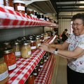 Entries to the Adult Food Preservation exhibit line the shelves at the 2009 Benton County Fair.