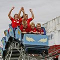 Children ride a roller coaster during the 2009 Benton County Fair Kids’ Day.
