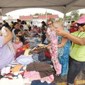 VENERABLE VOLUNTEERS - Tanika Anderson, right, a volunteer and member of Life Harvester Church in Fa...