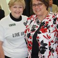 Ellyn Schleiffarth of the Girl Scouts Diamond Council, left, and Ruthanne Hill of Northwest Arkansas...