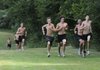 The Fayetteville cross country team runs Friday in Fayetteville.