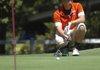 Rogers Heritage’s Hayden Bough eyes a putt on No. 6 during Tuesday’s match against Springdale Har-Ber at Prairie Creek Country Club.