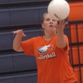 Rogers Heritage’s Courtney Heiligenthal serves during a Lady War Eagles practice Tuesday in Rogers.