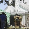 An outbuilding owned by Joe Mathias, 1616 N. Dixieland Road in Rogers, caught fire just after noon T...