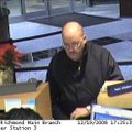 In this Dec. 19, 2008 surveillance photo provided by the Federal Bureau of Investigation, a bank rob...